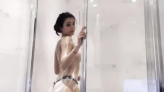 CrazyM caresses the clitoris under the table