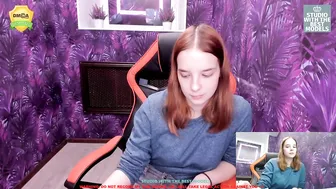 liacoy busty chick poses for the camera